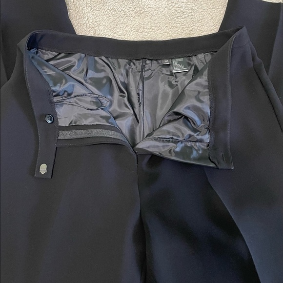 100% polyester lined dress pants hook and button waist. Very nicely made. - Picture 7 of 8